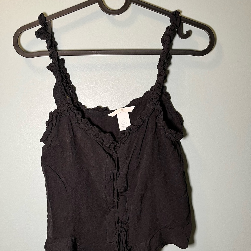 black ruffled women’s top
